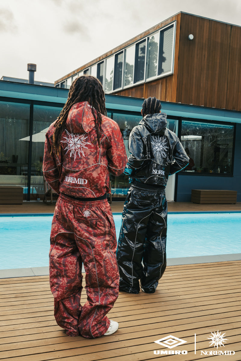 【NOREMID × UMBRO】 REFLECTIVE NYLON PANTS - BROWN